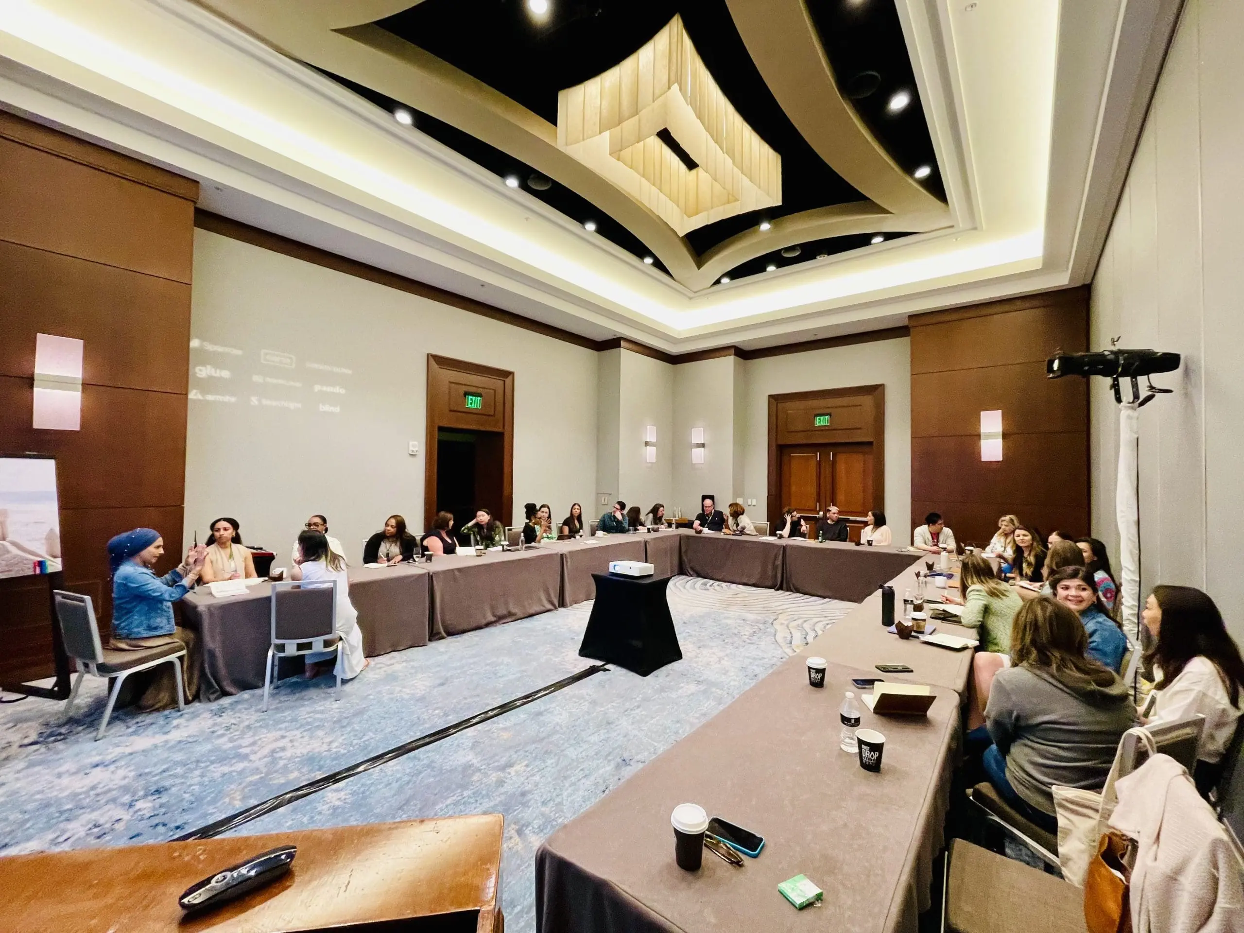 Leaders participating in a live AI workshop